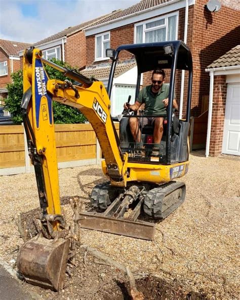 how to level a garden with a mini digger|mini garden digger tutorial.